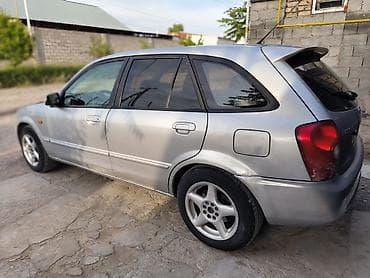 Mazda 323: 2003 г., 2 л, Кол менен иштөөчү, Газ, Хетчбек — 5