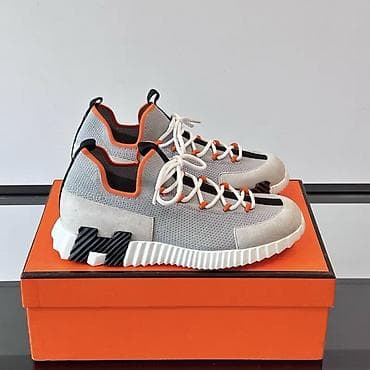 Прокат одежды: Кроссовки с выраженной подошвой и контрастной отделкой - Дизайн — 2