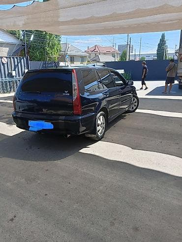 Унаа: Mitsubishi Lancer: 2005 г., 2 л, Кол менен иштөөчү, Бензин, Универсал — 4