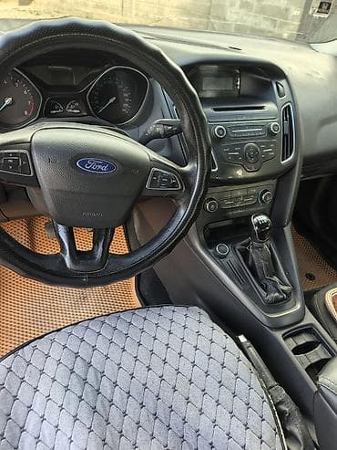 Продажа авто: Ford Focus: 2016 г., 1.6 л, Механика, Бензин, Универсал — 9