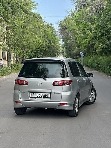 спойлери: Mazda Demio: 2003 г., 1.3 л, Автомат, Бензин, Хэтчбэк — 2