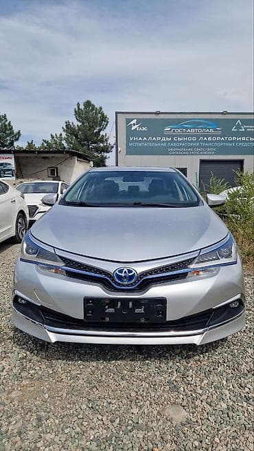 Toyota Corolla: 2019 г., 1.8 л, Робот, Гибрид, Седан
