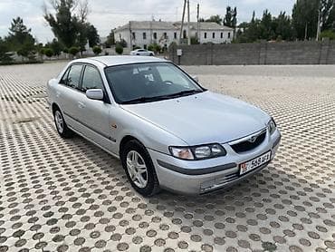 down pipe: Mazda 626: 1998 г., 2 л, Механика, Бензин, Седан — 1