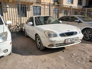 полик нексия 2: Daewoo Nubira: 1999 г., Механика, Седан — 5