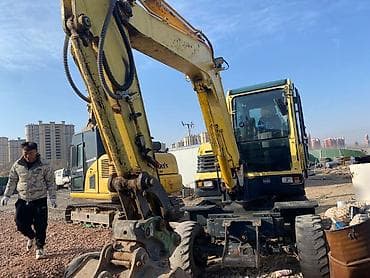 автомобильный пылесос: Экскаватор, 2010 г., Колесный — 10