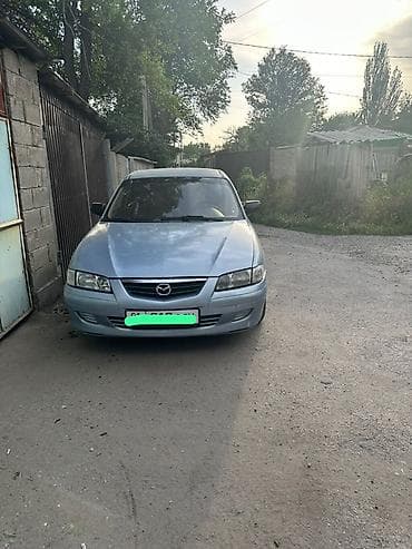 Транспорт: Mazda 626: 2000 г., 2 л, Механика, Бензин, Хэтчбэк — 1