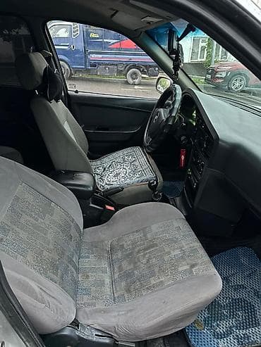 bmw e63: Представлен седан Chevrolet Nexia серебристого цвета. Автомобиль — 6