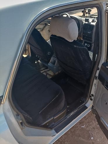 уаз hunter: ГАЗ 3110 Volga: 1998 г., 2.4 л, Механика, Бензин, Седан — 7