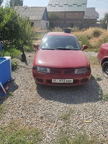 e38 bmw: Mitsubishi Carisma: 1998 г., Седан — 1