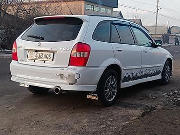 kia joice: Mazda Familia: 2000 г., 1.8 л, Автомат, Газ, Универсал — 4