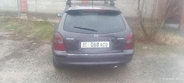 Mazda 323: 1999 г., Универсал