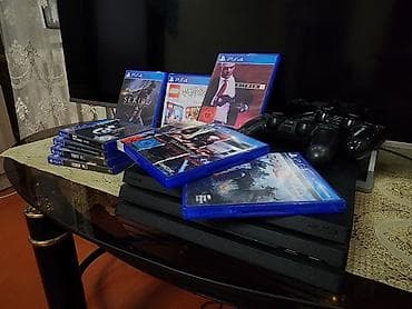 суу матор: Игровая консоль Sony PlayStation 4 (черная, серия Pro) с комплектом — 2