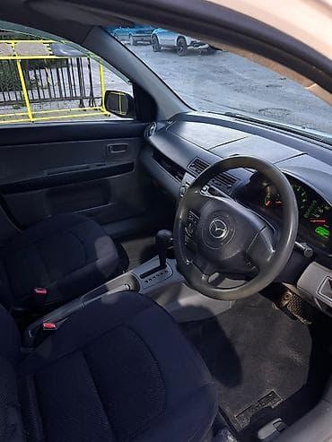 на мазду: Mazda Demio: 2003 г., 1.3 л, Автомат, Бензин — 9