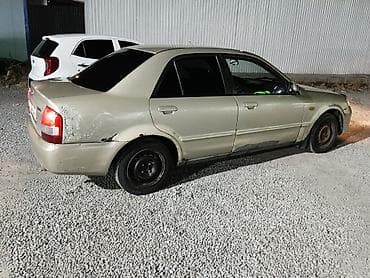 мотор 323: Mazda 323: 2001 г., Седан — 5