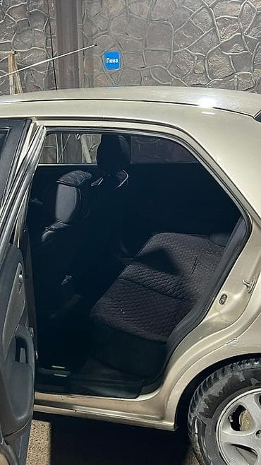 глушитель москвич: Mazda 626: 1999 г., 1.8 л, Механика, Газ — 6