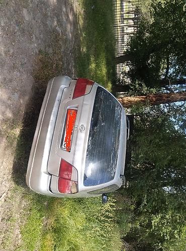 портер капот: Nissan Primera: 2001 г., 1.8 л, Универсал — 4