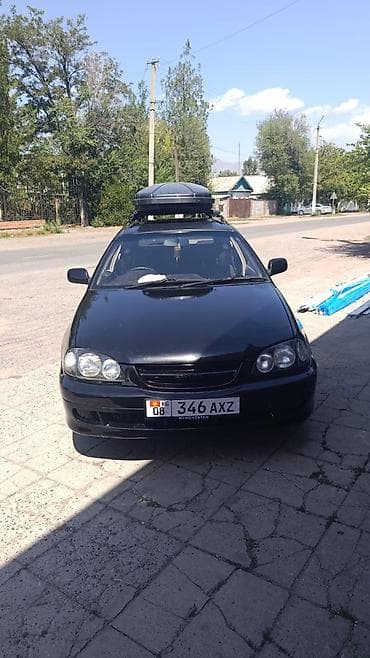 adblue бишкек: Автомобиль универсал черного цвета с аэродинамическим багажным боксом — 2