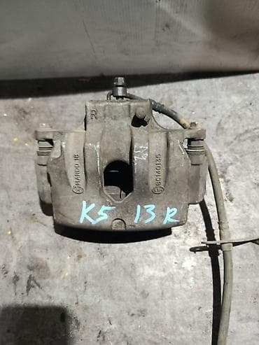 Суппорты: Передний левый суппорт Kia 2013 г., Оригинал — 1