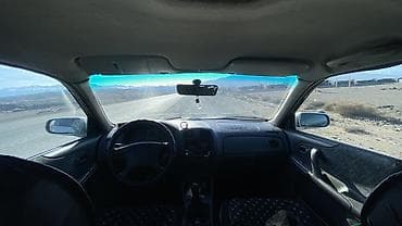 bnw x5: Mazda 323: 1998 г., 1.6 л, Механика, Бензин, Универсал — 6