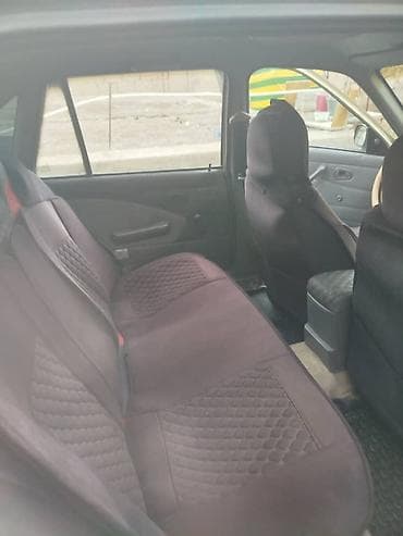 бмв е60 2004: Daewoo Nexia: 2005 г., 1.5 л, Механика, Бензин, Седан — 6