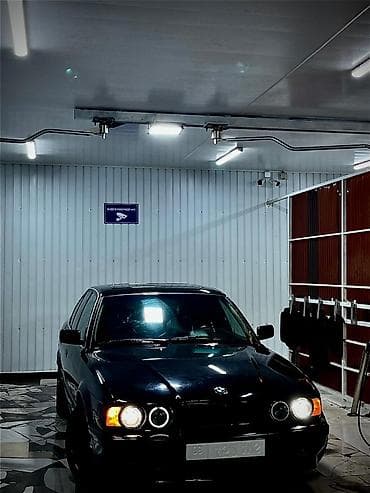 машина с российскими номерами: BMW 5 series: 1991 г., 2 л, Механика, Бензин, Седан — 9