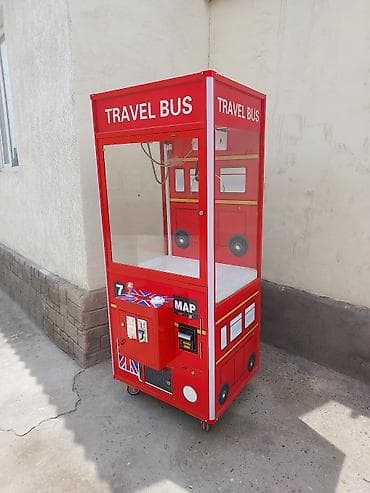 Игровой автомат «Travel Bus» — аппарат типа «кран-кошка» (claw — 1
