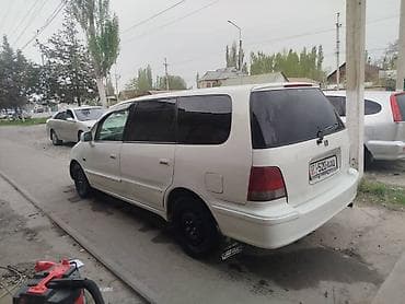 лобовое одиссей: Honda Odyssey: 1998 г., 2.3 л, Автомат, Бензин, Минивэн — 5