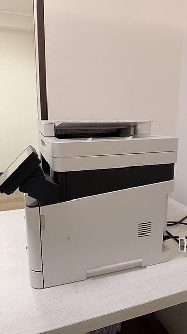 Принтеры: Цветное лазерное МФУ Canon i-SENSYS MF657Cdw - Тип: Laser All-In-One — 2