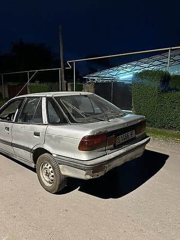 митсубиси спейк стар: Mitsubishi Lancer: 1990 г., Седан — 2