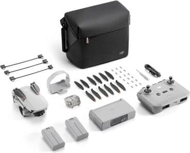 куплю дрон с камерой: Квадрокоптер DJI Mini 2 SE Fly More Combo DJI Mini 2 SE — лучший дрон — 1