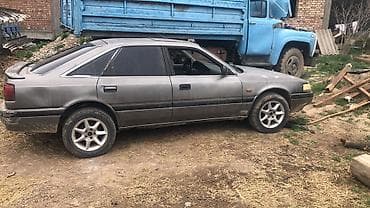 амортизатор на демио: Mazda 626: 1989 г., 2 л, Ручные, Бензин, Седан — 2