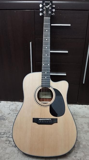 комбик: SAGA SF600C — это акустическая гитара формата Dreadnought (41") с — 1