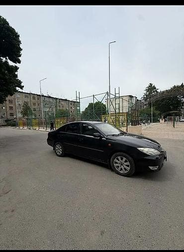 салон машины: Toyota Camry: 2004 г., 0.3 л, Автомат, Бензин, Седан — 4