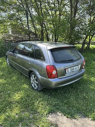 ауди универсал 80: Mazda 323: 2003 г., 1.6 л, Автомат, Бензин, Хэтчбэк — 4