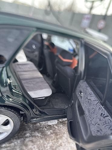 mazda 323 2003: Mazda 323: 2000 г., 1.6 л, Механика, Бензин, Универсал — 1