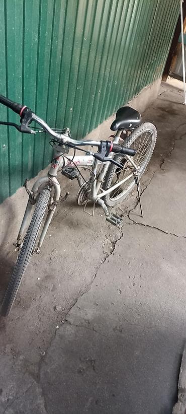 Горный велосипед с колесами 26" x 1.95 (50‑559). Особенности: - Рама