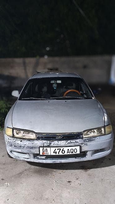 mazda 323: Mazda 626: 1993 г., 2 л, Механика, Бензин, Хэтчбэк — 1