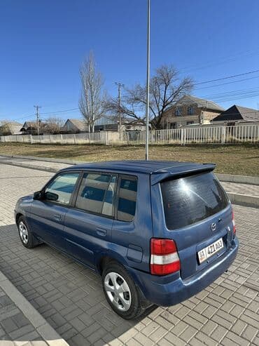 крыло нексия 1: Mazda Demio: 2001 г., 1.3 л, Автомат, Бензиновая, Хэтчбэк — 1