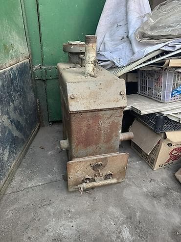 Твердотопливный отопительный котел (металлический). Описание: -