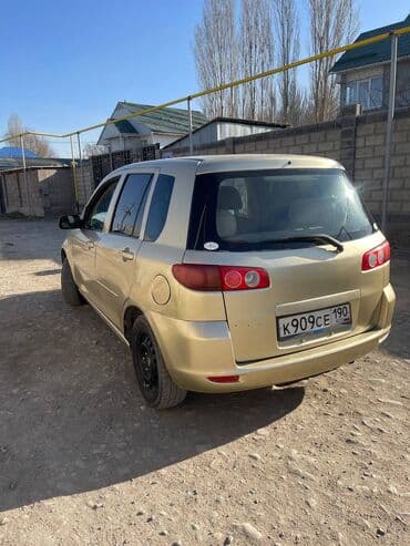 дом на обмен: Mazda Demio: 2003 г., 1.3 л, Автомат, Бензиновая, Хэтчбэк — 1