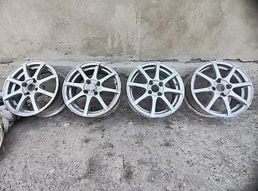 audi q7: Комплект из 4 легкосплавных дисков R-14/4x100 !

только бмен на R-15 — 1