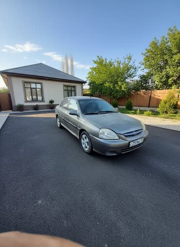кун для мини трактора: Kia Rio: 2005 г., Механика, Бензиновая, Седан — 1