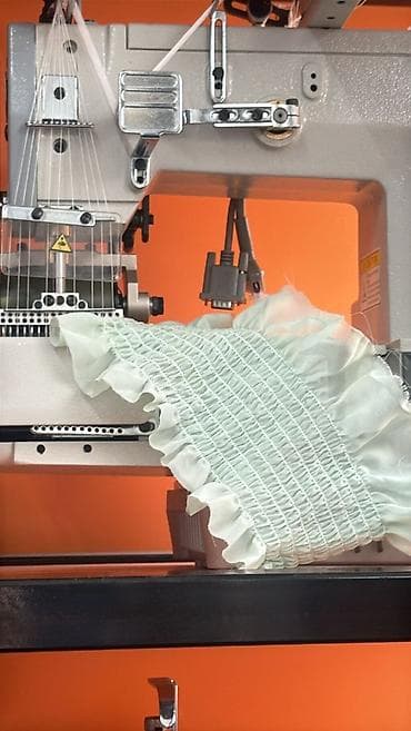 Промышленная швейная машина для сборки/строчения с эластичной нитью