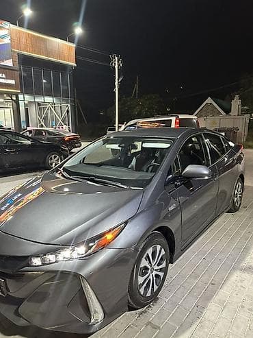byd e2 2023: Toyota Prius: 2020 г., Гибрид, Хэтчбэк — 1