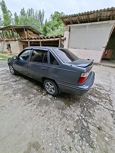 адисей обсалют: Daewoo Nexia: 1996 г., Седан — 4
