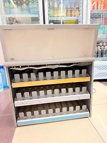 упаковочные пакеты: Диспенсер/прилавочный стенд для табачной продукции с лифтовой подачей — 1