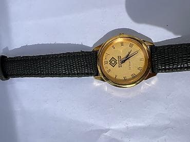 Срочно продаю «Кумторские» юбилейные золотые часы в хорошем состоянии