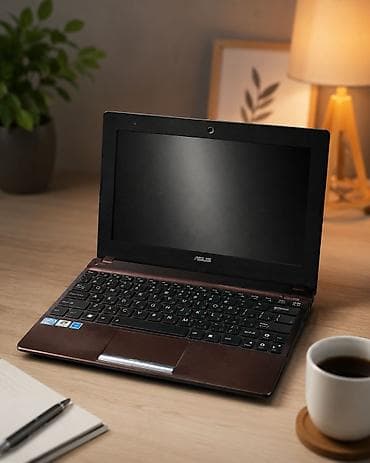 Компактный ноутбук ASUS (11–12" диагональ) в коричнево‑черном