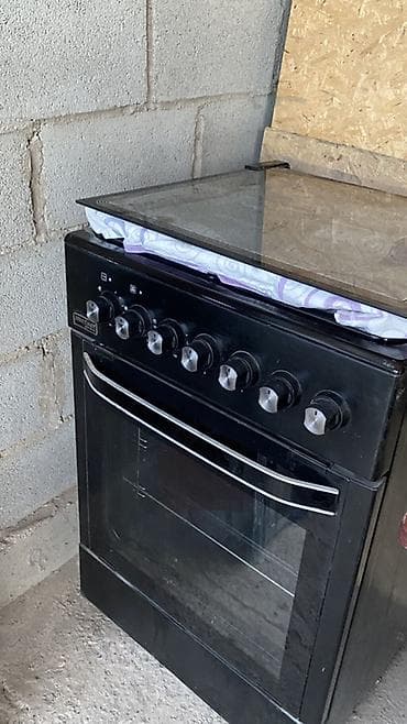 baking oven: Кухонная плита с духовкой, цвет черный. Особенности: - Тип: напольная — 1