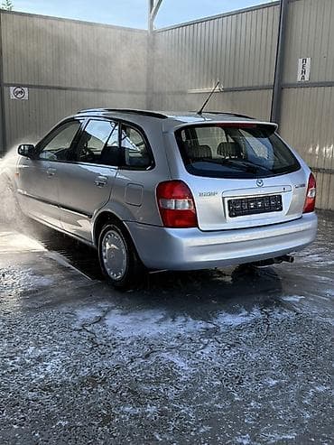 mercedesbenz 211: Mazda 323: 2000 г., Механика, Бензин, Универсал — 8